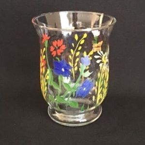 Colorful hand painted vase with spring flowers